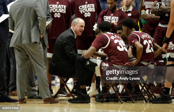 Ben Howland the head coach of the Mississippi State Bulldogs gives instructions to his team against the Alabama Crimson Tideduring the second round...