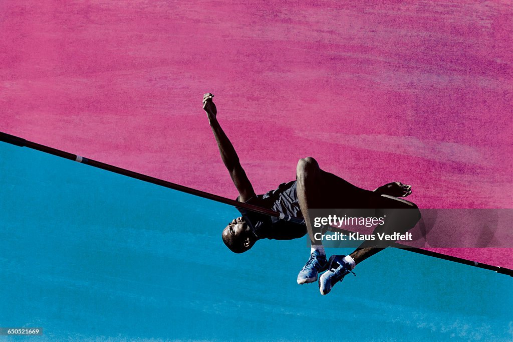 Male athlete doing highjump