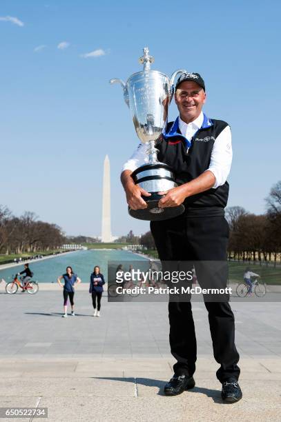 Rocco Mediate poses for a portrait with the Alfred S. Bourne Trophy at the Lincoln Memorial during the 78th KitchenAid Senior PGA Championship Media...