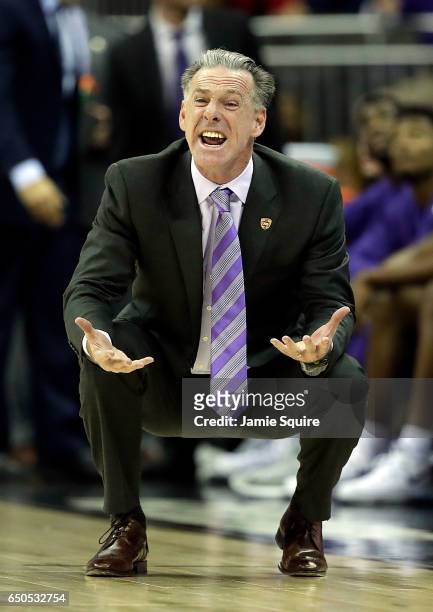 Head coach Jamie Dixon of the TCU Horned Frogs reacts on the bench during the quarterfinal game of the Big 12 Basketball Tournament against the...