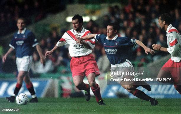 Rangers' Barry Ferguson challenges with Airdrie's Kenneth Black during the Scottish League Cup Semi Final between Glasgow Rangers and Airdrieonians...