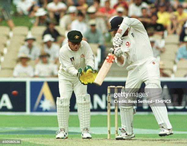 England's Michael Atherton nicks the ball to be caught by Australia's Mark Taylor and dismissed for 41
