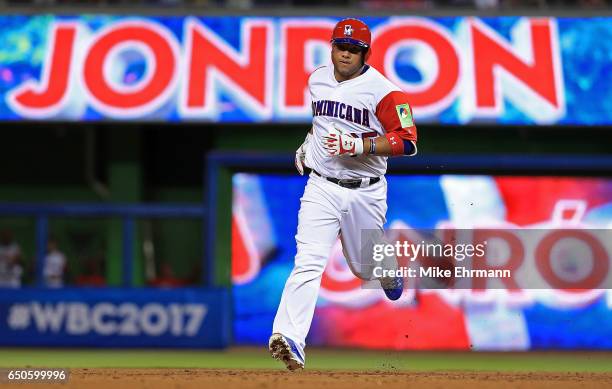 Welington Castillo of the Dominican Republic hits a two run home run during a Pool C game of the 2017 World Baseball Classic against Canada at Miami...