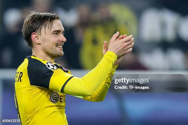 Marcel Schmelzer of Borussia Dortmund celebrate their win after the UEFA Champions League Round of 16: Second Leg match between Borussia Dortmund and...