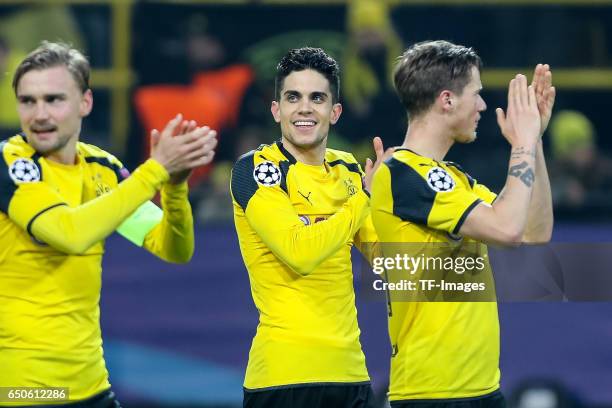 Marc Bartra of Borussia Dortmund celebrate their win after the UEFA Champions League Round of 16: Second Leg match between Borussia Dortmund and SL...