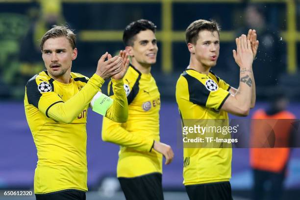 Marcel Schmelzer of Borussia Dortmund celebrate their win after the UEFA Champions League Round of 16: Second Leg match between Borussia Dortmund and...