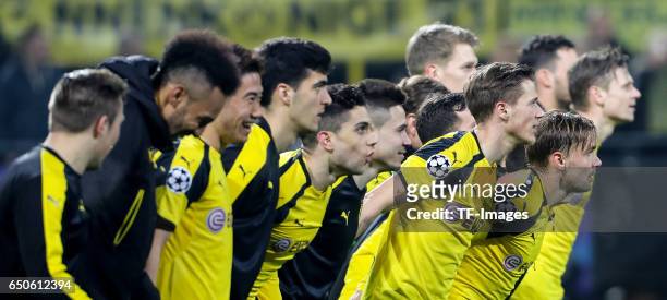 Players of Borussia Dortmund celebrate their win after the UEFA Champions League Round of 16: Second Leg match between Borussia Dortmund and SL...