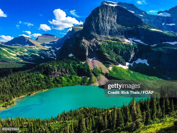 scenic view of grinnell lake - grinnell lake bildbanksfoton och bilder