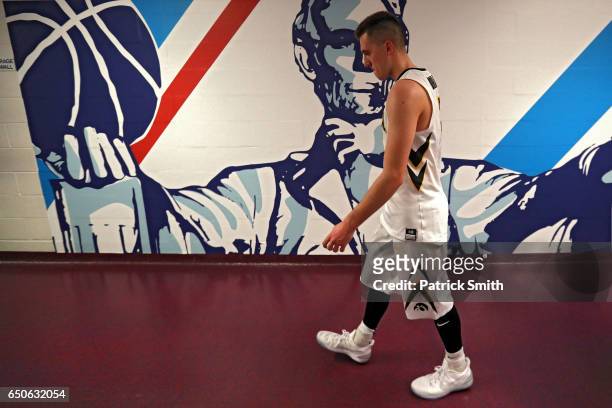 Jordan Bohannon of the Iowa Hawkeyes walks to the locker room after losing the Indiana Hoosiers during the second half in the second round of the Big...