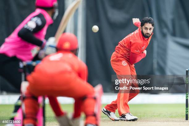 Saeed Ajmal of HKI United bowls during the Hong Kong T20 Blitz match between Hung Hom JD Jaguars and HKI United at Tin Kwong Road Recreation Ground...