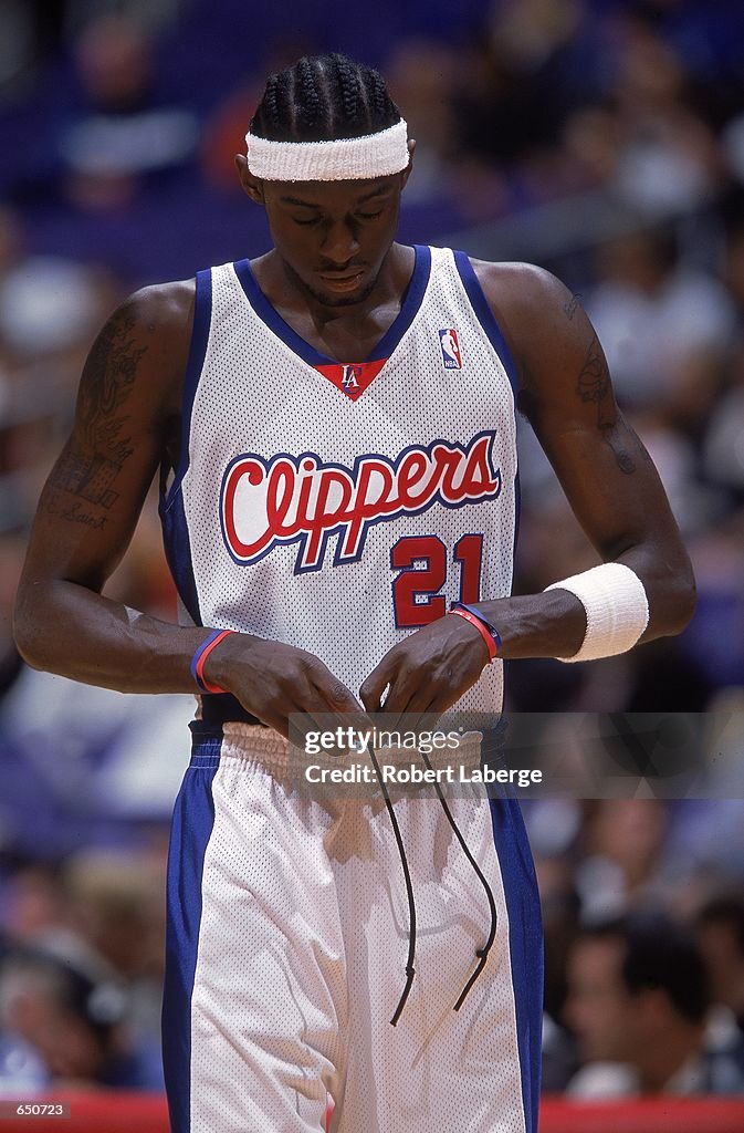 Darius Miles of the Los Angeles Clippers takes a moment to fix his News  Photo - Getty Images