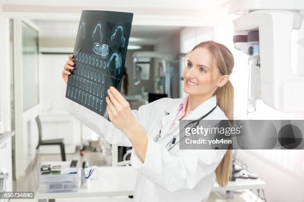 dental x-ray image looks good ! - dental record stock pictures, royalty-free photos & images