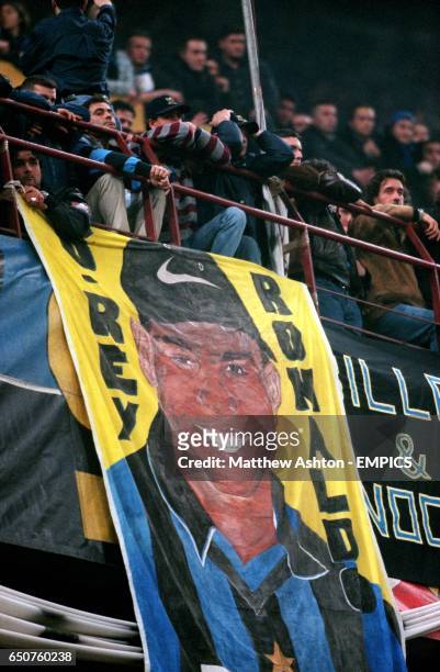 Inter Milan's fans drape a Ronaldo banner over the side of the stand