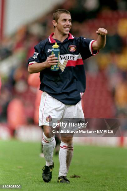 Sunderland's two goal striker Kevin Phillips celebrates after the match