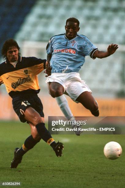 Boca Juniors' Cristian Traverso tackles Celta Vigo's Benny McCarthy