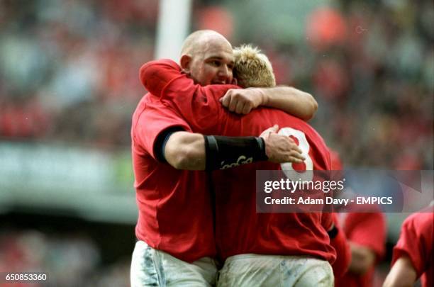 Wales's Craig Quinnell congratulates his brother Scott on his try