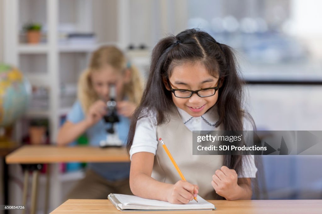 Student Class Assignment Excited Student Completes Class Assignment High-Res Stock Photo - Getty ...
