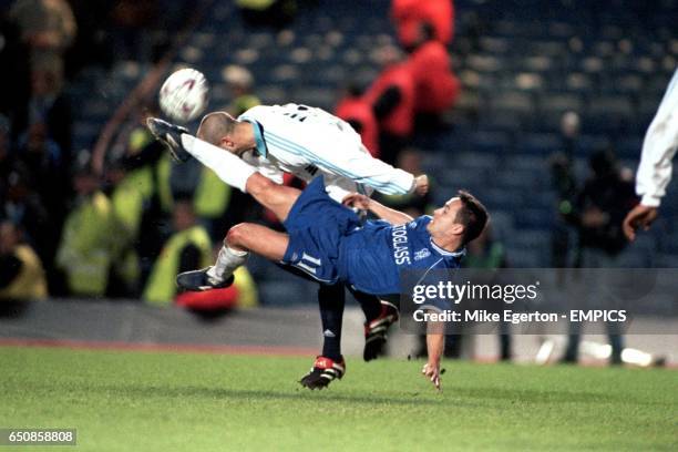 Chelsea's Dennis Wise clears with an overhead kick