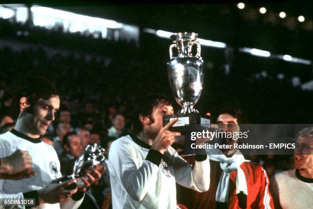 Czechoslovakia's Antonin Panenka, scorer of the winning penalty, kisses the trophy in celebration