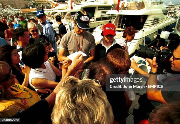 Heinz Harald Frentzen signs autographs for the fans by the harbour