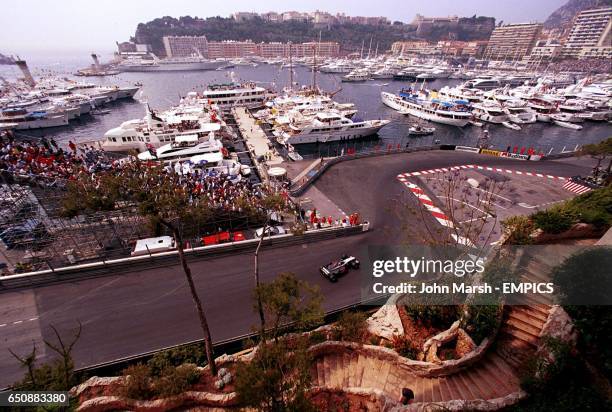Mika Hakkinen drives past the harbour on his way to setting 5th fastest time in qualifying