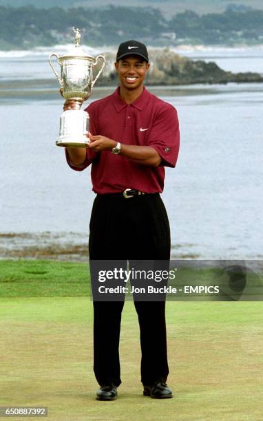 Tiger Woods lifts the US Open Trophy at Pebble Beach