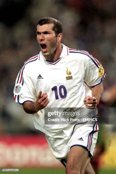 France's Zinedine Zidane celebrates scoring the penalty that sent them into the final of Euro 2000