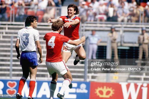 England's Bryan Robson celebrates with teammate Terry Butcher after scoring the fastest goal in World Cup history - just 27 seconds after kick off