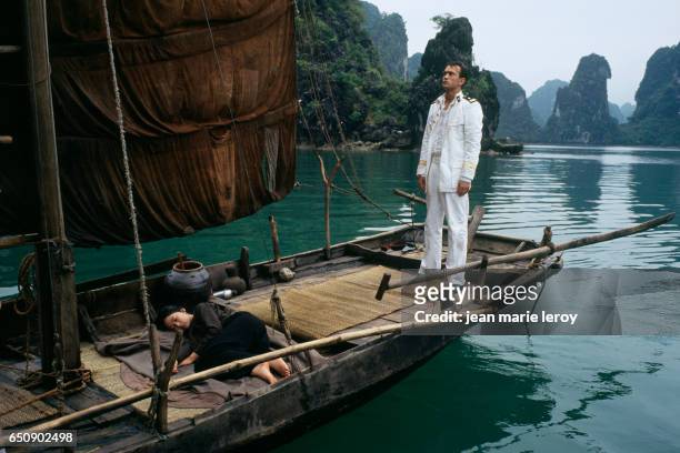 Swiss actor Vincent Perez and Vietnamese actress Linh Dan Pham on the set of "Indochine", by French director, screenwriter and actor Regis Wargnier.