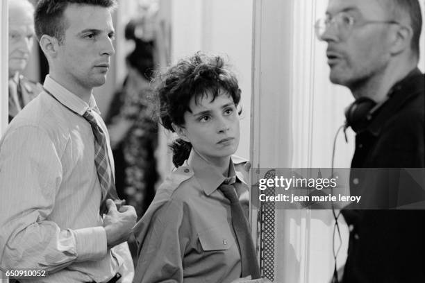 French actor, director, screenwriter and producer Mathieu Kassovitz and Belgian actress Anouk Grinberg on the set of Un Heros Tres Discret , by...