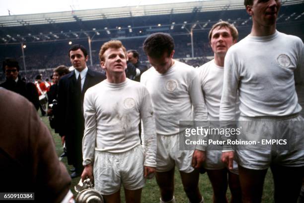 Leeds United's Billy Bremner, Paul Reaney, Jimmy Greenhoff and Jackie Charlton celebrate with the League Cup after their victory