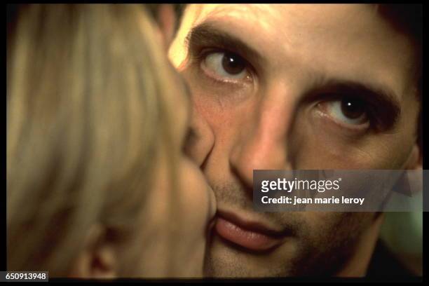 French actress Sandrine Kiberlain and actor, director, screenwriter and producer Mathieu Kassovitz on the set of "Un héros très discret" by French...