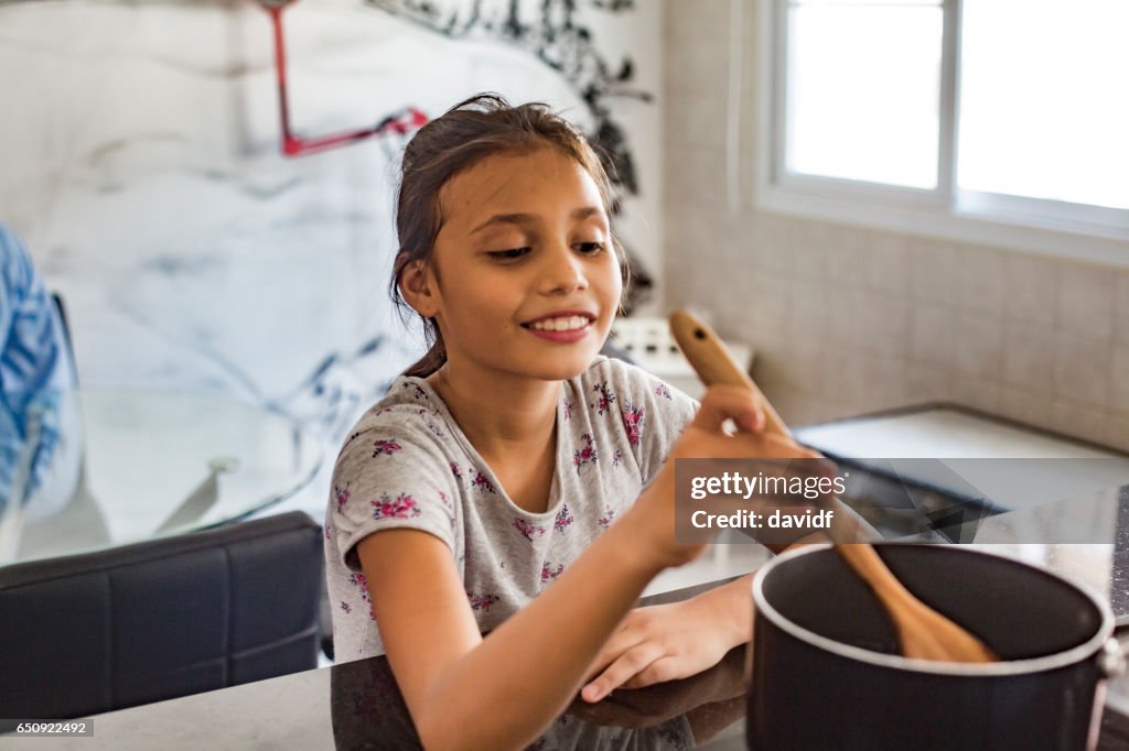 Young Asian Girl Cooking