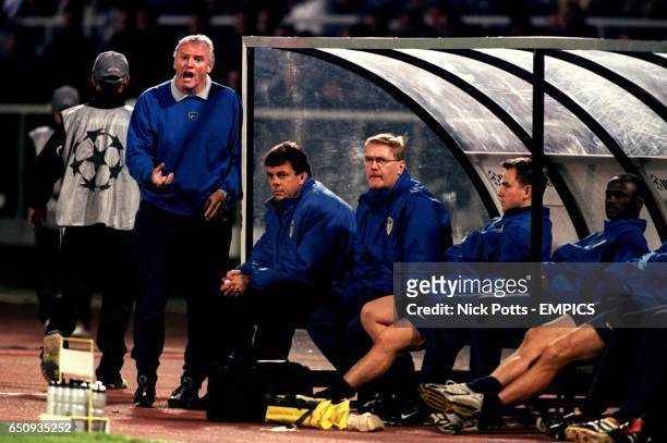 Leeds United's manager David O'Leary watches in silence as his assistant Eddie Gray barks instructions to the players
