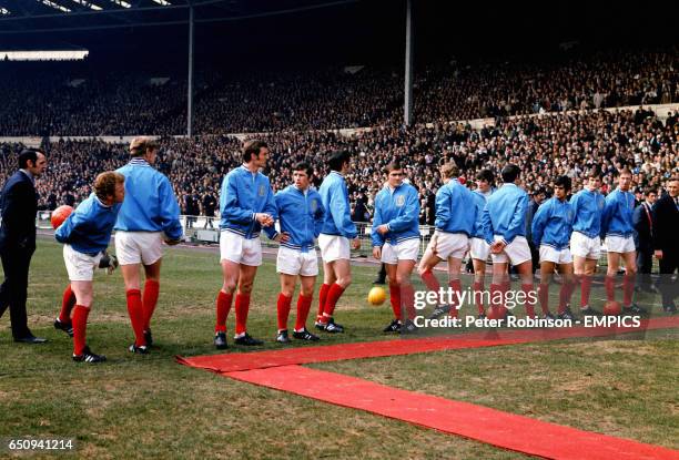 Leeds United wait to meet the assembled dignitaries before the match: Billy Bremner, Gary Sprake, Paul Madeley, Johnny Giles, Norman Hunter, Terry...