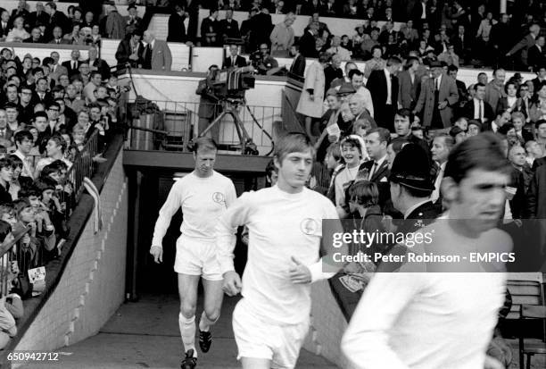 Leeds United's Jack Charlton, Allan Clarke and Rod Belfitt run out
