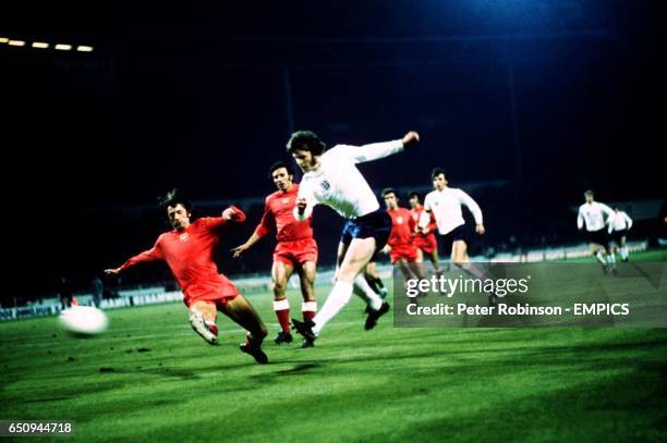 England's Mike Channon fires a shot past Poland's Miroslaw Bulzacki