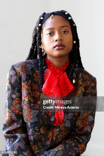 hip, fashionable, african american model with braids - floral pattern jacket stock-fotos und bilder
