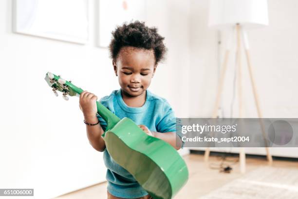 toddler and music education - toddler musical instrument stock pictures, royalty-free photos & images