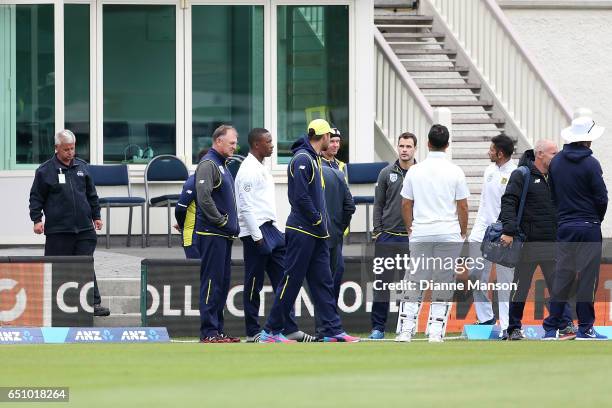 Full field evacuation during day three of the First Test match between New Zealand and South Africa at University Oval on March 10, 2017 in Dunedin,...