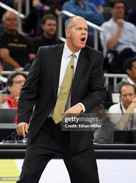 Head coach Tad Boyle of the Colorado Buffaloes reacts during a quarterfinal game of the Pac-12 Basketball Tournament against the Arizona Wildcats at...