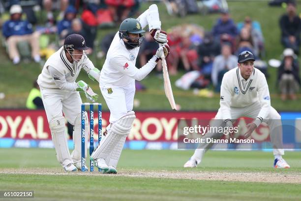 Hashim Amla of South Africa bats during day three of the First Test match between New Zealand and South Africa at University Oval on March 10, 2017...