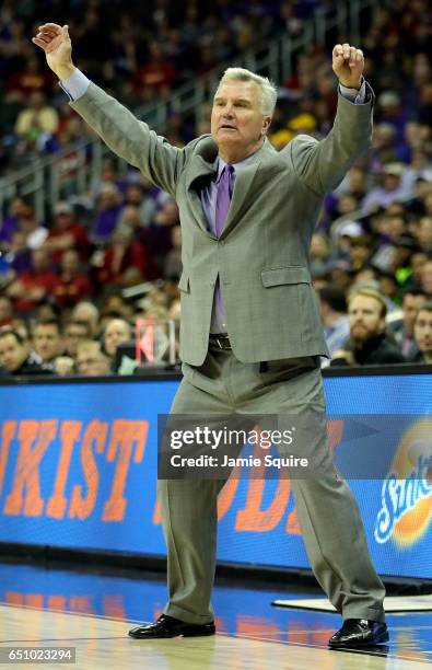 Head coach Bruce Weber of the Kansas State Wildcats reacts on the bench during the quarterfinal game of the Big 12 Basketball Tournament against the...