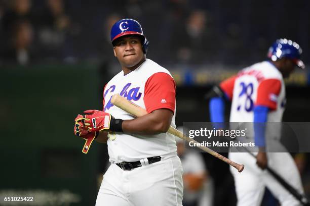 Outfielder Alfredo Despaigne of Cuba reacts after striking out in the bottom of the fourth inning during the World Baseball Classic Pool B Game Five...