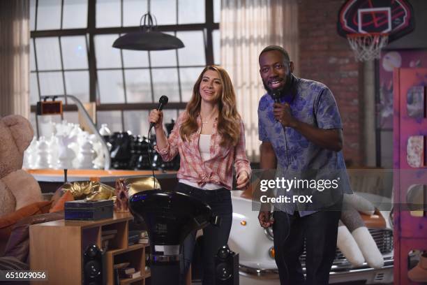 Guest star Nasim Pedrad and Lamorne Morris in the "Socalyalcon VI" episode of NEW GIRL airing Tuesday, March 14 on FOX.