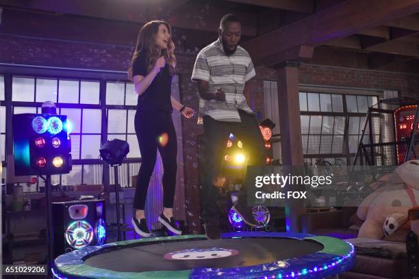 Guest star Nasim Pedrad and Lamorne Morris in the "Socalyalcon VI" episode of NEW GIRL airing Tuesday, March 14 on FOX.