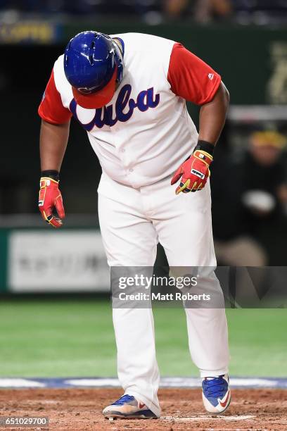 Outfielder Alfredo Despaigne of Cuba scores after hitting a grand slam to make it 1-4 in the bottom of the fifth inning during the World Baseball...