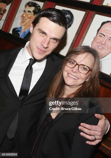 Finn Wittrock and Sally Field pose at the opening night after party for "The Glass Menagerie" on Broadway at Sardi's on March 9, 2017 in New York...