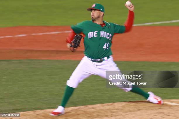 Oliver Perez of Mexico pitches in the bottom of the ninth inning during the World Baseball Classic Pool D Game 1 between Italy and Mexico at...