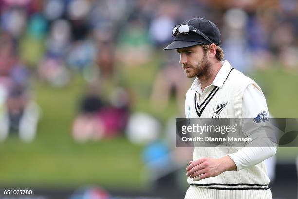 Kane Williamson of New Zealand looks on during day three of the First Test match between New Zealand and South Africa at University Oval on March 10,...